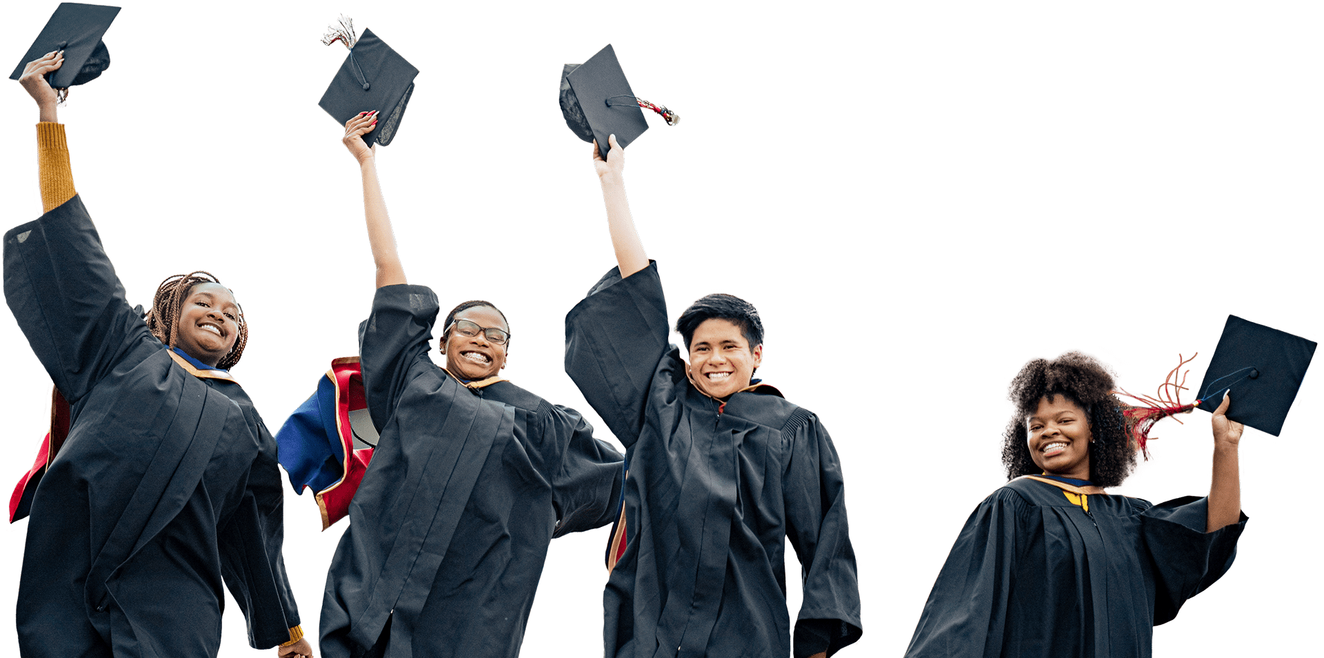 University graduates jumping in the air