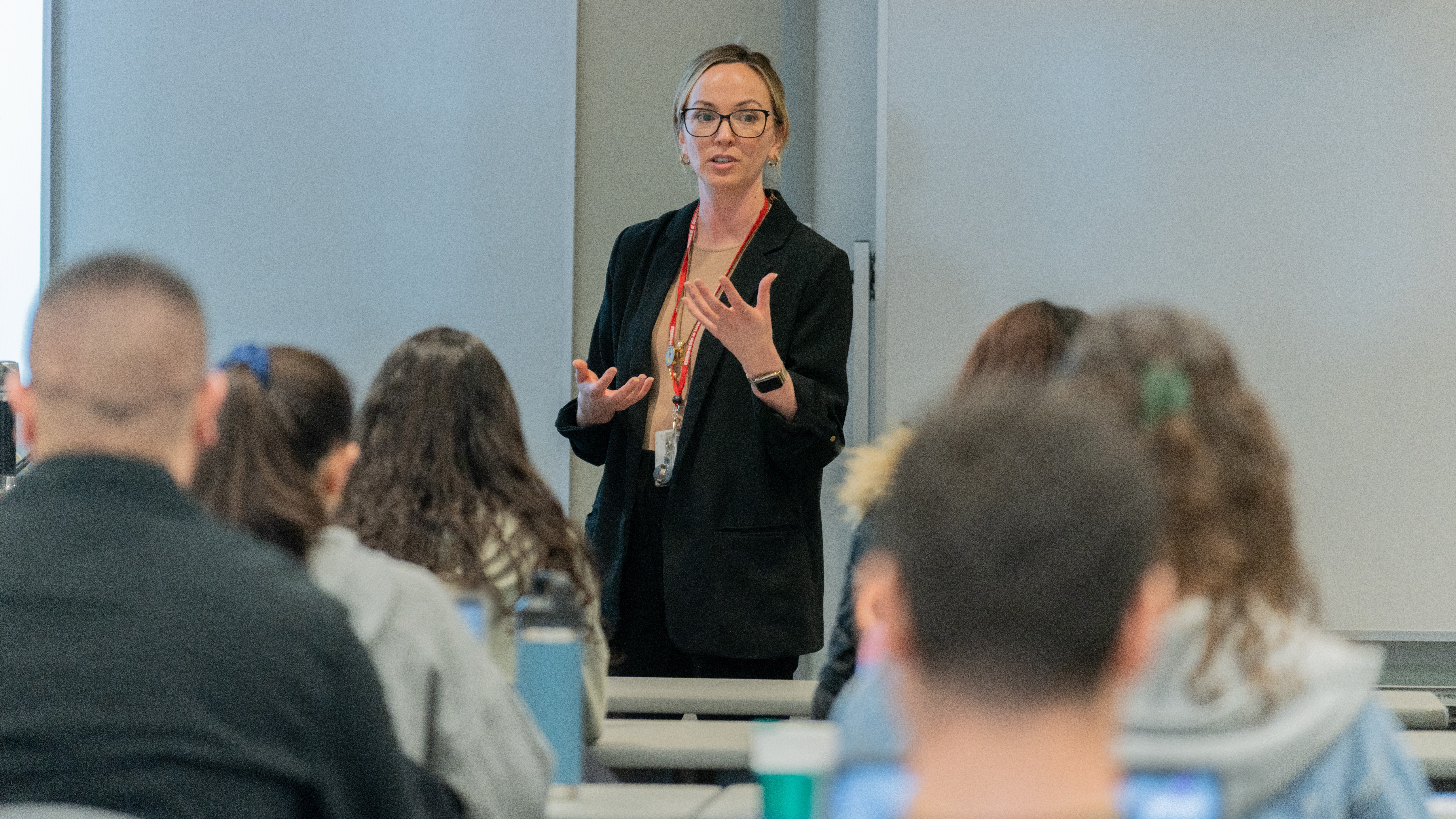 Instructor speaking to students