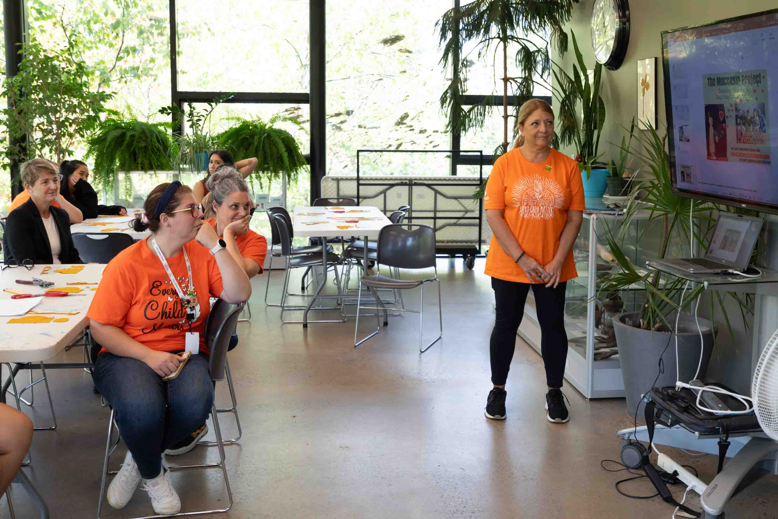 Students and staff watching a presentation