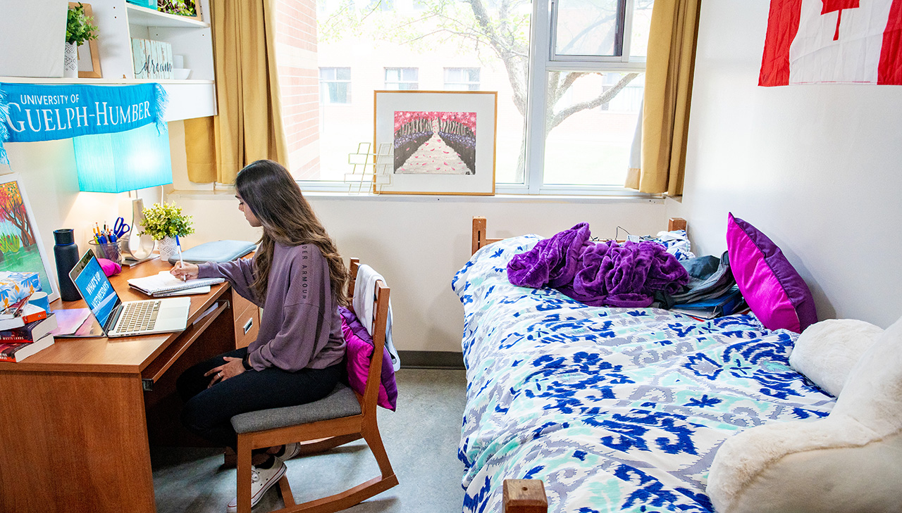 student in residence room